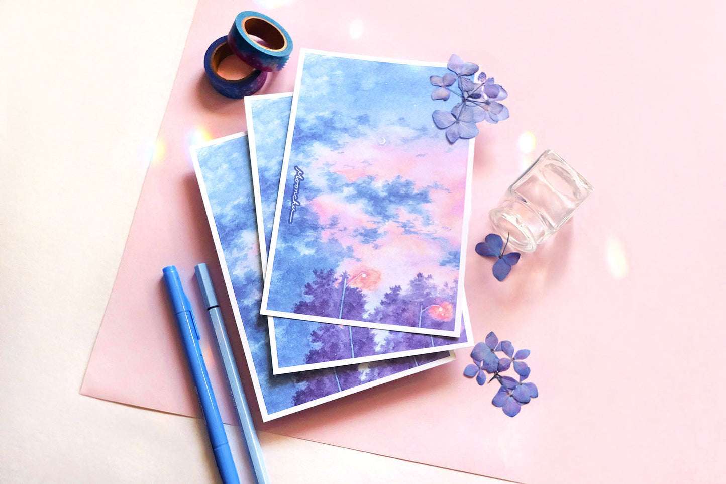image of soothing painting of a pastel blue and pink sky with streetlamps and purple trees by moonchu.