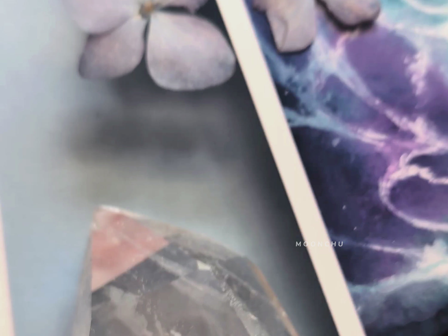 a video showcasing original painting by moonchu. features clear quartz crystals, dried hydrangea flowers, and high quality art print. illustrates details and colour and quality of the painting recreation.