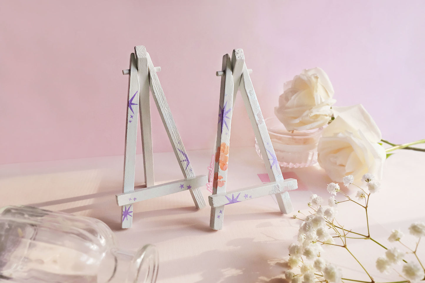 stars and stars and clouds easel add ons. hand-painted easels by moonchu. easel bases are white, with twinkling purple stars, and the other option has purple stars with orange and pastel metallic blue clouds. whimsical easels to place your loose-leaf calendars upon.
