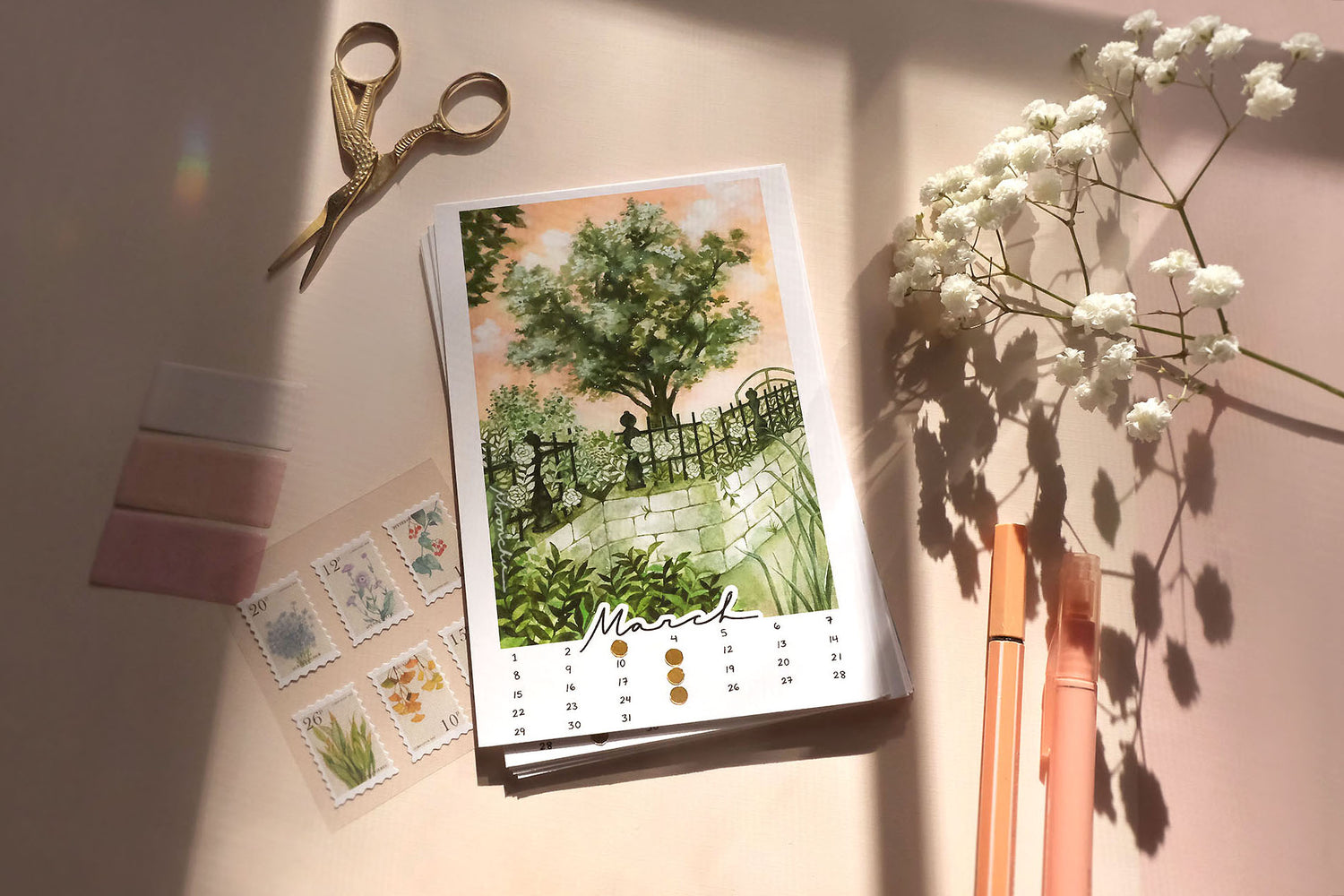 the month of march for the moonchu calendar. this original illustration is comprised of a peachy golden sky overlooking lush greenery comprised of a big tree, white roses, various foliage, and a stone wall. dreaming of a peaceful sunlit stroll. dedicated to the plant lovers, gardeners, and cottagecore folks. march is in cursive script at the bottom, hand-written numbers date the month. hand-placed golden circles notate the moon phases of the month. backdrop is warm-toned with flowers and sunbeams.