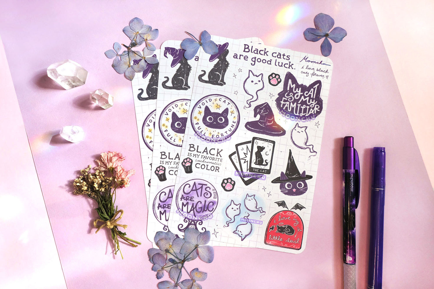 moonchu original art sticker sheet as a love letter to black cats. features several black cat text, including black cats are good luck and i love black cats forever, as well as black cats with witch hats, paw prints, crystal ball, cat ghosts etc.